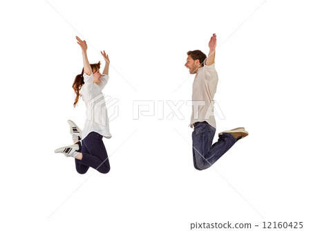 Couple jumping in the air 12160425