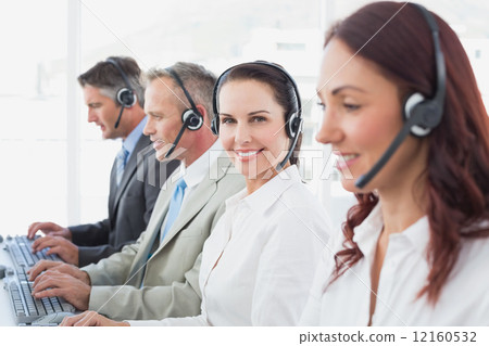 Call center workers all smiling 12160532