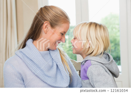 Cute daughter and mother together 12161034