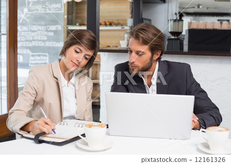 Business colleagues working on their break Business colleagues working on their break 12161326