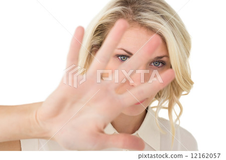 Portrait of young woman signals stop Portrait of young woman signals stop 12162057