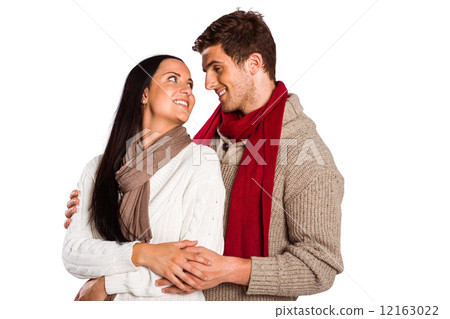 Young couple smiling and hugging Young couple smiling and hugging 12163022