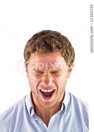 Angry man shouting towards camera 12163193