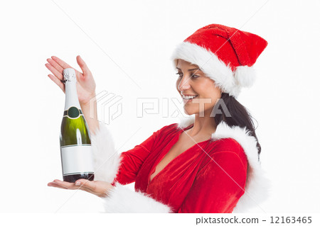 Woman holding a champagne bottle Woman holding a champagne bottle 12163465