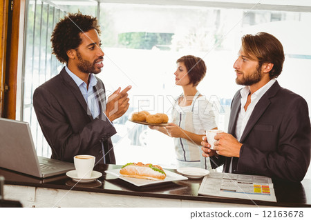 Stock Photo: Businessmen enjoying their lunch hour