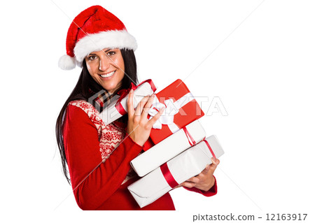 Young brunette with many christmas presents 12163917