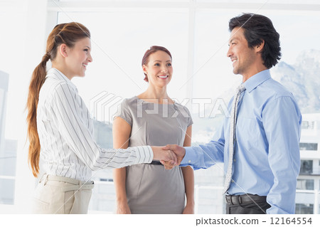 Business man shaking colleagues hand Business man shaking colleagues hand 12164554