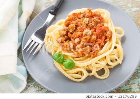 Stock Photo: Spaghetti bolognese with basil leave