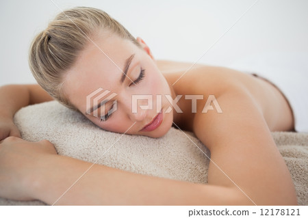 Beautiful blonde relaxing on massage table Beautiful blonde relaxing on massage table 12178121