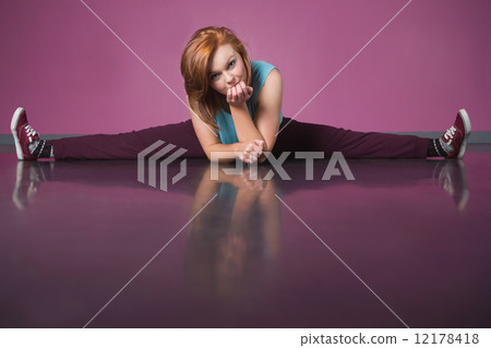 Pretty break dancer doing the splits 12178418