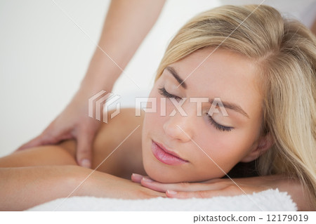 Pretty blonde enjoying a massage 12179019