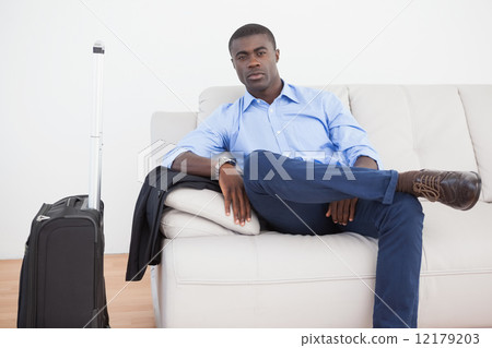 Businessman waiting for a flight Businessman waiting for a flight 12179203