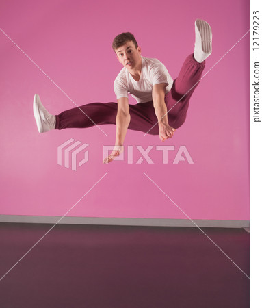 Cool break dancer mid air doing the splits Cool break dancer mid air doing the splits 12179223