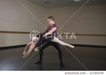 Ballet partners dancing gracefully together Ballet partners dancing gracefully together 12180249