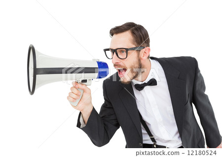 Geeky businessman shouting through megaphone Geeky businessman shouting through megaphone 12180524