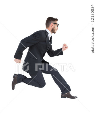 Geeky young businessman running mid air 12180884