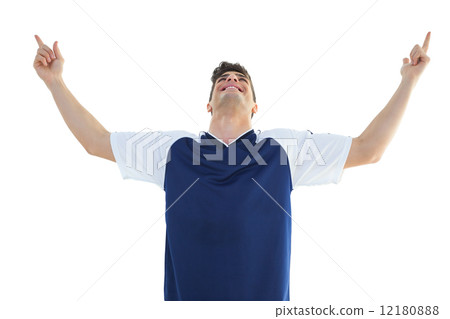 Football player in blue celebrating 12180888
