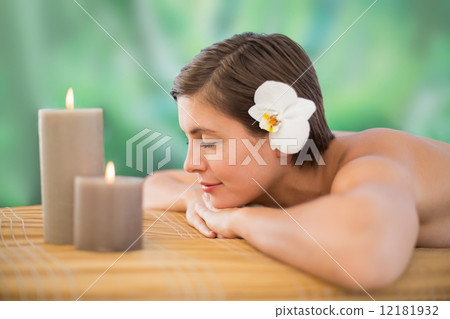 Beautiful young woman on massage table 12181932