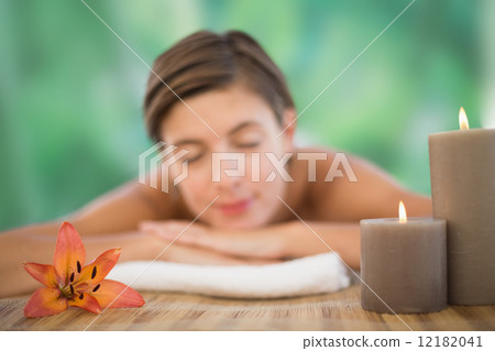 Beautiful woman on massage table at health farm 12182041