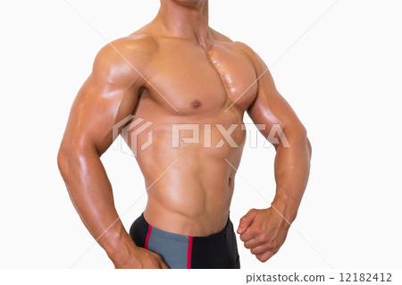 Mid section of shirtless muscular man 12182412