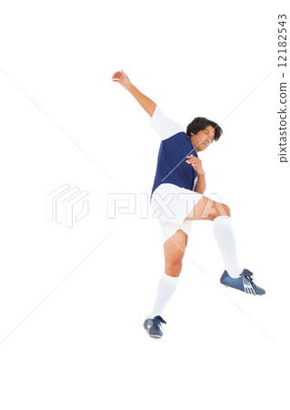 Football player in blue kicking Football player in blue kicking 12182543