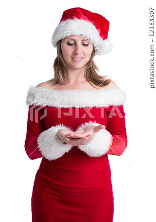 Pretty woman in santa costume presenting your product 12183307