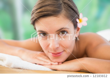 Close up of a beautiful woman on massage table Close up of a beautiful woman on massage table 12183812