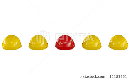 Line of yellow safety helmets with a red one 12185361