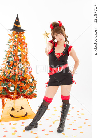 A girl in a lovely small devil costume in Halloween 12187717