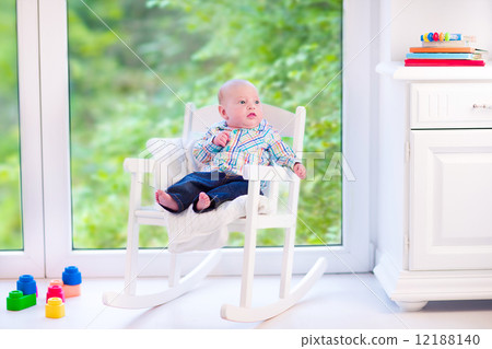 Baby boy in a rocking chair Baby boy in a rocking chair 12188140