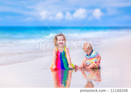 Kids playing on the beach Kids playing on the beach 12188206