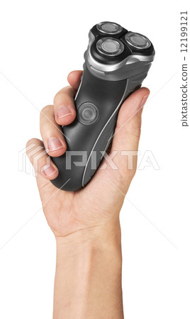 Electric shaver in hand Electric shaver in hand 12199121