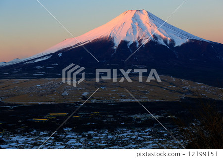 Mt. Fuji and the streets of Oshino in the morning glow seen from Mt. 12199151