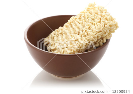 raw wheat vermicelli in a clay bowl raw wheat vermicelli in a clay bowl 12200924