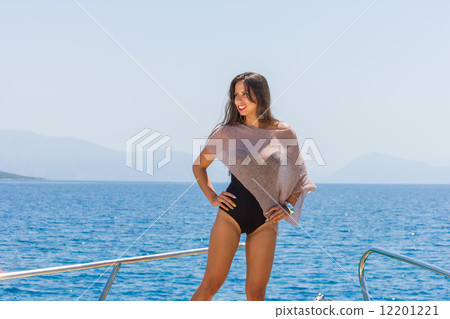 Young woman on her private yacht 12201221