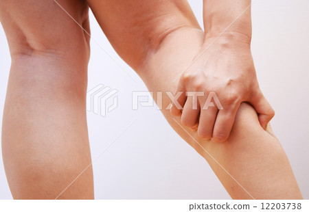Image of a woman whose calf is sore 12203738