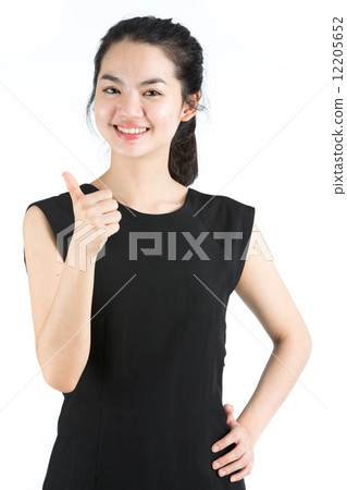 Young asian woman giving thumbs up 12205652