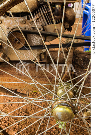 old rusty engine of lawnmower 12206077