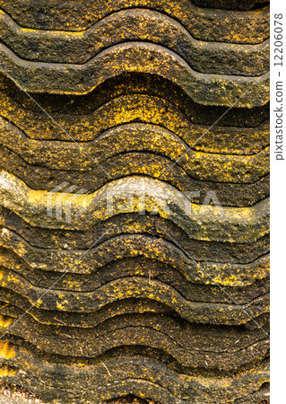 Piles of old roof tiles 12206078