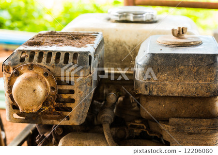 old rusty engine of lawnmower 12206080