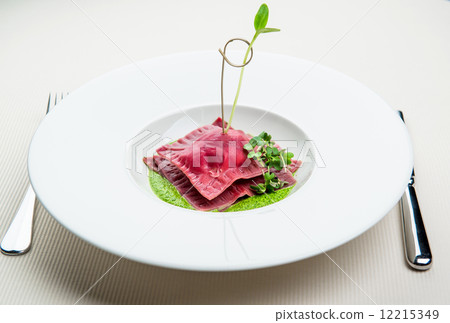 Beet ravioli with Parma ham Beet ravioli with Parma ham 12215349