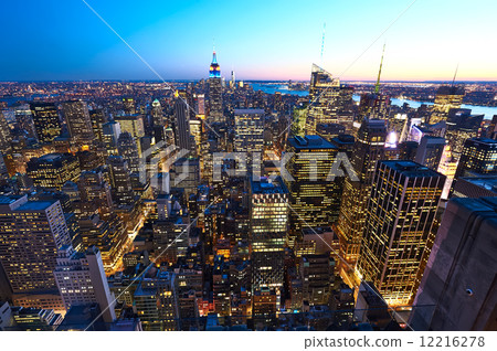 Cityscape view of Manhattan with Empire State Building at night 12216278