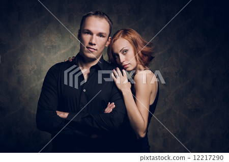 Portrait of couple in love, studio shot 12217290