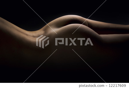 Erotic woman's buttocks over black background Erotic woman's buttocks over black background 12217609