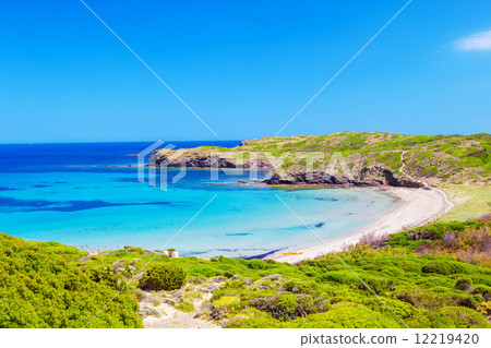 Platja del Tortuga beach in sunny day at Menorca Platja del Tortuga beach in sunny day at Menorca 12219420