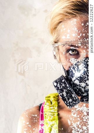 Female wearing a respirator 12222627