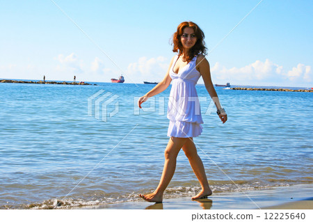 Woman on beach Woman on beach 12225640
