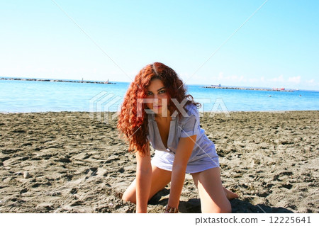 Woman on beach Woman on beach 12225641