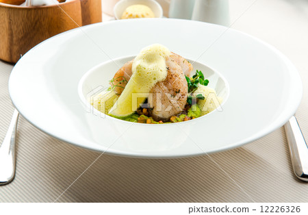 Sea bass fillet infused with sauce foam 12226326