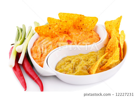 Nachos, guacamole and cheese sauce,  vegetables 12227231